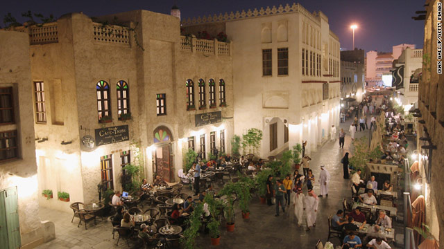 Tourists and locals dine in the Souq Waqif in Doha, Qatar. The Souq Waqif is among the capital's biggest tourist attractions.