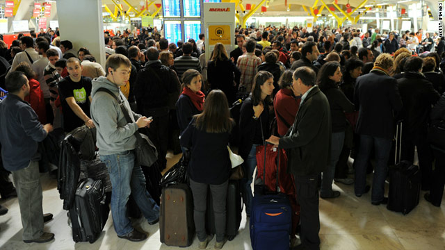 Passengers wait as Barajas airport is crippled by a sudden strike on December 3, 2010 in Madrid, Spain.