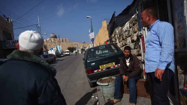 Palestinian men gather near the "City of David" Jewish settlement on March 2 in the East Jerusalem neighborhood of Silwan.