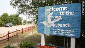Kure Beach officials say they will crack down on people wearing thongs in the seaside community.