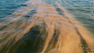An orange chemical dispersant is used in the Gulf of Mexico off the coast of Louisiana.