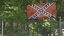 The flag appears near the Massachusetts school.