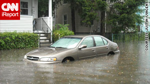 CNN iReporter Justin Vincent took this photo of a half-submerged  car in Somerville, Massachusetts, on Saturday.