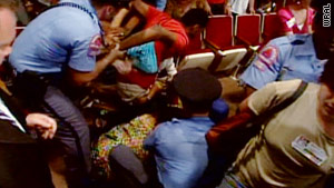 Police arrest protesters at a school board meeting Tuesday in Raleigh, North Carolina.