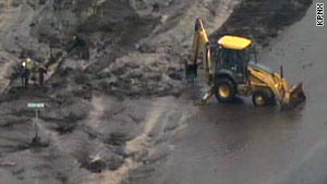 Several small streams pushed over their banks, and flash floods were threatening homes near Flagstaff, Arizona.