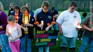 Friends and family members hold a candlelight vigil during the West Virginia coal mine disaster in April.