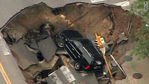 Milwaukee Sinkhole on Milwaukee  Wisconsin  Motorist Whose Suv Fell Into A Large Sinkhole