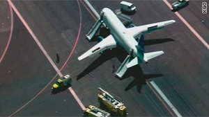 4 hurt evacuating jet after tire blowout