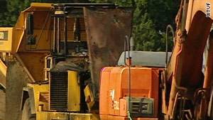 Saturday's fires destroyed an earth mover and damaged other vehicles at the Murfreesboro, Tennessee, site.