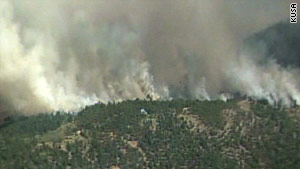 In Colorado's Four Mile Canyon region, 45-mph winds are helping to spread the flames of a 3,000-acre wildfire.