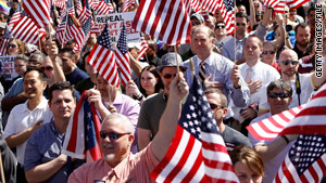 People rally earlier this year seeking the repeal of the "don't ask, don't tell" policy.