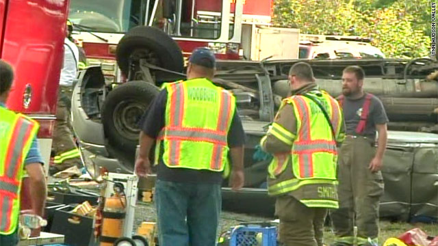Rescue personnel work the scene of a multiple-fatality crash on I-87 in Orange County, New York.