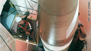 An Air Force technician inspects a Minuteman III missile in a silo in North Dakota.