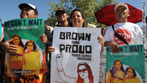 Demonstrators protest in Phoenix, Arizona, in May against the state's tough immigration law.