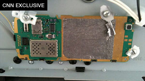 The devices were designed to be detonated by a cell phone, a source close to the investigation told CNN.