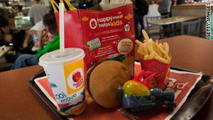 The ordinance requires Happy Meals and other fast food with toys to meet new nutritional standards .