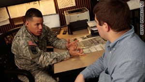 Army recruiter Staff Sgt. Pablo Valdez Martinez, left, chats with a potential Army recruit this week in New York.