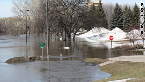 Melting snow has caused the Red River to swell. On Wednesday, the river was 12 feet above flood stage.