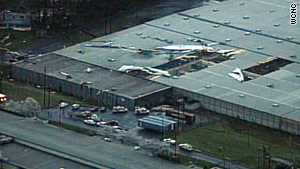 The tornado damaged a mobile home, toppled trees, and several buildings.