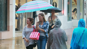 The remnants from Tropical Storm Nicole brought rain to Miami Beach, Florida, on Wednesday.