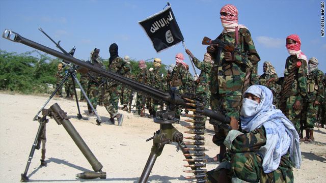 Recently trained Shebab fighters at a military exercise in northern Mogadishu's Suqaholaha neighborhood on January 1, 2010.