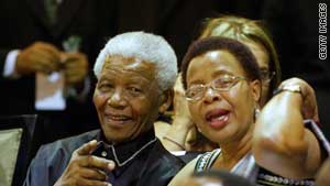 Nelson Mandela and his wife, Graca Machel, made a rare appearance Thursday as the nation's parliament honored him.