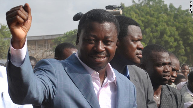 Togolese President Faure Gnassingbe greets supporters March 4 after casting his vote in Lome, Togo.