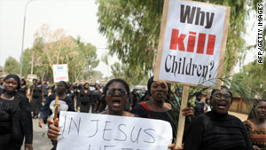 Thousands of Nigerian women dressed in black protest aganst the recent violence on March 11.