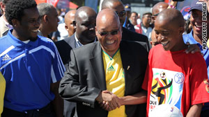 President Zuma (center) chats to young footballers on April 21 to mark the 50-day countdown to World Cup.