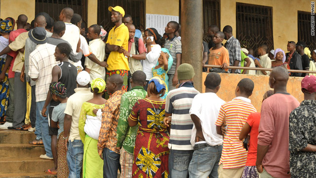 Voters queue outside a polling station in Conakry, the Guinean capital.