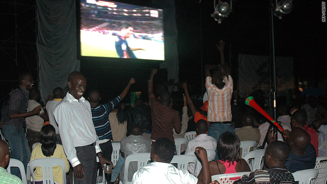 People watch the World Cup final at a restaurant in Kampala late 
on July 11, moments before blasts tore through the crowds.