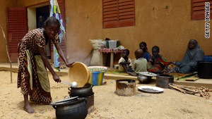 A group of flood victims gather at a school in Naimey, Niger.