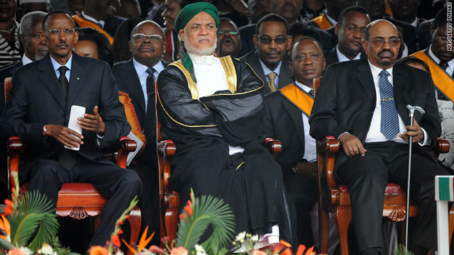 Al-Bashir, right, alongside Comoros President Ahmed Sambi Abdallah, center, and Rwandan President Paul Kagame, left.