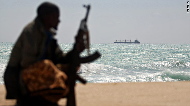 A pirate off the shores of Hobyo in northeastern Somalia earlier this year - Somali pirates now hold 18 ships and 383 hostages.