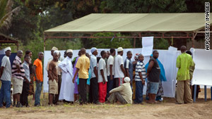 Voters queue in Tanzania on Sunday.