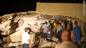 Regine Madhere reportedly has been texting from beneath a collapsed market in Port-au-Prince.