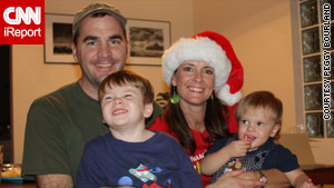 Ken and Peggy Bourland hold their sons Charley and Andrew. She has not heard from him since he sent an e-mail from Haiti.