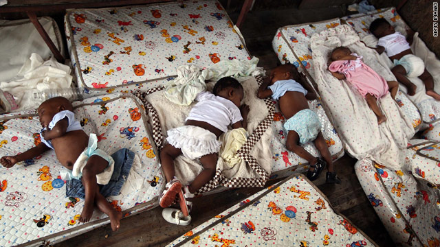 Haitian orphans rest on mattresses in a truck this week at the Maison des Enfants de Dieu orphanage in Port-au-Prince.