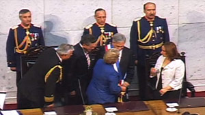 Television footage showed Sebastian Pinera's presidential inauguration proceeding without a hitch.