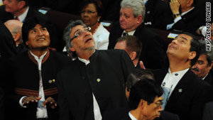 From left: The presidents of Bolivia, Paraguay and Ecuador react to a quake in Congress in Valparaiso, Chile.