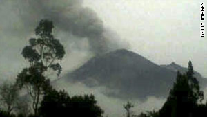 Picture released by Ecuadorean Army of the Tungurahua volcano as it is seen erupting.