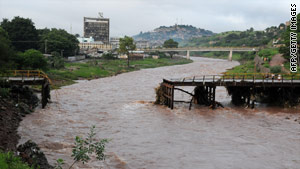 A bridge over the Choluteca River in Tegucigalpa, Honduras, lies in ruin Monday after Tropical Storm Agatha.