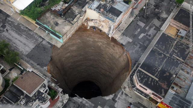 The office of Guatemala's president handed out this aerial 
view of a crater that opened up after Agatha hit.