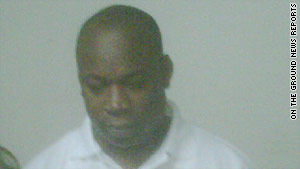 Christopher "Dudus" Coke was booked Tuesday night after his arrest outside Kingston, Jamaica.