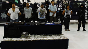 Mexican police show off the latest suspects captured as they investigate the kidnapping of three journalists.