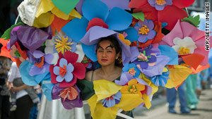 A woman rehearses for Mexico's bicentennial celebrations Saturday in Mexico City.