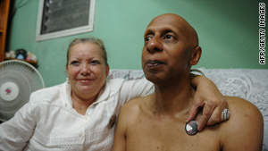 Cuban political dissident Guillermo Farinas, right, with Laura Pollan, leader of opposition movement Ladies in White.