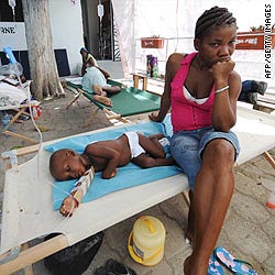 t1main.haiti.boy.woman.gi.jpg