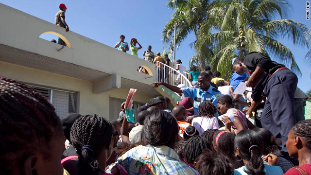 Haitians queue for electoral identification cards the day before the country's presidential election on Sunday, November 28, 2010.