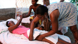 Falone Maxi was rescued from the rubble of her university building six days after the January 12 earthquake in Haiti. She recuperated under sheets pitched in the yard of a friend. She was too afraid to sleep within concrete walls.